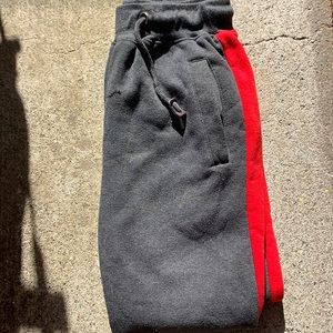 Grey  sweats with red on sides